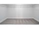 Empty walk-in closet with carpet flooring and built in wire shelving at 10084 Moss Rose Way, Orlando, FL 32832