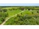 Aerial view of property featuring vast land and mature trees at 2440 S Wallace Rd, Bartow, FL 33830