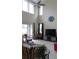Bright living room with high ceilings, large windows, and stylish furnishings at 6832 Thornhill Cir, Windermere, FL 34786
