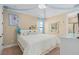 Charming bedroom with elegant decor, a plush bed, and ample natural light at 852 Desert Mountain Ct, Reunion, FL 34747