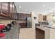 Well-equipped kitchen with stainless steel appliances and ample cabinet space at 852 Desert Mountain Ct, Reunion, FL 34747