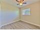 Standard bedroom featuring a ceiling fan and a window at 475 W Ethelene St, Bartow, FL 33830