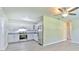 Modern kitchen featuring white cabinets and stainless steel appliances at 475 W Ethelene St, Bartow, FL 33830
