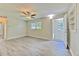 Living room featuring stylish gray wood flooring and natural light at 475 W Ethelene St, Bartow, FL 33830