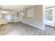 Spacious living area with updated floors, neutral paint, and a well-lit atmosphere for relaxation at 475 W Ethelene St, Bartow, FL 33830