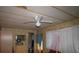 Bedroom featuring a ceiling fan, a dresser, and curtains at 515 Cassandra Ln, Lakeland, FL 33809