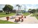 A community area with outdoor seating arrangements, tables and a gazebo at 515 Cassandra Ln, Lakeland, FL 33809