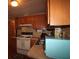Kitchen featuring an electric range and a stainless steel sink at 515 Cassandra Ln, Lakeland, FL 33809