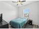 Simple bedroom with a ceiling fan boasts plank flooring and bright window at 1143 Presidential Ln, Apopka, FL 32703
