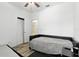 Cozy bedroom with plank flooring features a ceiling fan and offers plenty of natural light at 1143 Presidential Ln, Apopka, FL 32703
