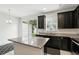 Modern kitchen featuring granite countertops and stainless steel appliances at 1143 Presidential Ln, Apopka, FL 32703