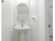 Powder room with an oval mirror at 1143 Presidential Ln, Apopka, FL 32703