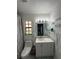 Bathroom features a stylish single vanity and modern fixtures at 204 Madison St, Minneola, FL 34715
