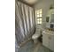 Bathroom features a stylish single vanity and modern fixtures at 204 Madison St, Minneola, FL 34715