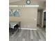 Open dining area with table, chairs, and neutral decor at 204 Madison St, Minneola, FL 34715