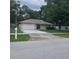 Charming home with attached garage and front yard at 204 Madison St, Minneola, FL 34715