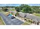 Aerial view of parking, landscaping, and condos with easy parking and serene curb appeal at 4711 Club Cir, Lakeshore, FL 33854