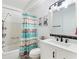 Neat bathroom featuring a shower-tub combination, a vanity with a sink, and modern fixtures at 4711 Club Cir, Lakeshore, FL 33854