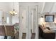 Open living space with dining area, mirrored closet doors, and a comfortable seating area at 4711 Club Cir, Lakeshore, FL 33854