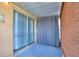 Enclosed patio with sliding glass doors offering private relaxation at 4711 Club Cir, Lakeshore, FL 33854