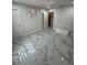 Bright bedroom with white marble floors and decorative wall flowers at 10090 Se 67Th Ter, Belleview, FL 34420