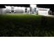 Well-lit single-story home featuring a manicured front yard and a 'For Sale' sign at 10090 Se 67Th Ter, Belleview, FL 34420