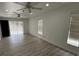 Bright and airy bedroom with hardwood floors, large windows, and ample closet space at 13774 Meadowpark Ave, Orlando, FL 32826