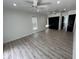 Spacious bedroom with hardwood floors, ceiling fans, and lots of natural light at 13774 Meadowpark Ave, Orlando, FL 32826