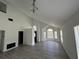 Spacious and bright living room with high ceilings, modern lighting, and hardwood floors at 13774 Meadowpark Ave, Orlando, FL 32826