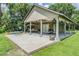 Expansive outdoor patio offering a covered space for relaxation and entertainment with seating, swing, and ceiling fans at 2925 Deerbrook Dr, Lakeland, FL 33811