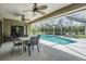 Inviting screened-in pool area with multiple seating areas, perfect for outdoor entertaining and relaxation at 2925 Deerbrook Dr, Lakeland, FL 33811