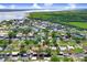 Scenic aerial view of a waterfront community with boat docks and access to a large lake at 93 Bream St, Haines City, FL 33844