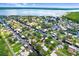 Aerial view showcasing a waterfront community with canals, lush greenery, and stunning water views at 93 Bream St, Haines City, FL 33844