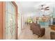 Open-concept living area with a view of the dining area and kitchen at 1032 Kelsea Cir, The Villages, FL 32159