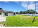 Spacious backyard offering ample space for outdoor activities at 2151 Groveglen S Ln, Lakeland, FL 33813
