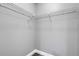 A gray-painted walk-in closet with wire shelving at 2151 Groveglen S Ln, Lakeland, FL 33813