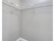 A gray-painted walk-in closet with wire shelving at 2151 Groveglen S Ln, Lakeland, FL 33813
