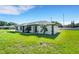 Stylish single-story home with black trim windows on a sunny day at 2151 Groveglen S Ln, Lakeland, FL 33813