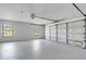 A spacious two-car garage featuring natural light and ample room at 2151 Groveglen S Ln, Lakeland, FL 33813