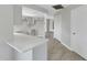 An open kitchen with a breakfast bar and ample counter space at 2151 Groveglen S Ln, Lakeland, FL 33813