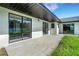 Covered patio with sliding glass doors, perfect for indoor-outdoor living at 2151 Groveglen S Ln, Lakeland, FL 33813