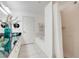 This bathroom showcases a tub and separate shower with modern fixtures, creating a relaxing retreat at 2256 Wekiva Village Ln, Apopka, FL 32703