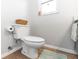 Clean half-bathroom with tile floors, toilet, and vanity with sink at 2423 Turnberry Dr, Oviedo, FL 32765