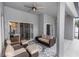 Covered patio with comfortable seating, perfect for outdoor relaxation and entertaining at 2423 Turnberry Dr, Oviedo, FL 32765