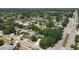 Picturesque aerial view of the neighborhood displaying well-maintained landscaping and proximity to roads at 3300 Glen Village Ct, Orlando, FL 32822