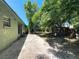 Backyard with concrete path and perimeter plants at 3300 Glen Village Ct, Orlando, FL 32822