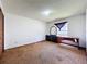 Bedroom showcasing a large window, dresser, and closet for storage at 3300 Glen Village Ct, Orlando, FL 32822