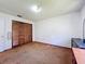 Spacious bedroom with closet and dresser offering ample storage solutions at 3300 Glen Village Ct, Orlando, FL 32822