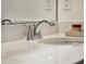 Modern bathroom showcasing a quartz countertop, chrome faucet, and stylish bathroom accessories at 5793 Timber Meadow Way, St Cloud, FL 34771