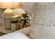 Comfortable bedroom details of throw pillows and nightstand decor at 5793 Timber Meadow Way, St Cloud, FL 34771